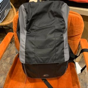 Deluxe Lowepro camera case backpack.